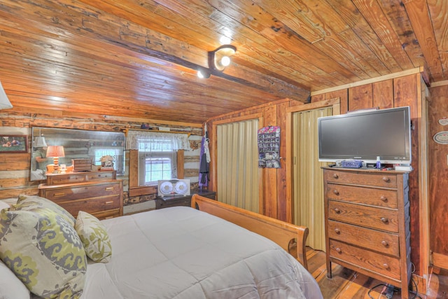 569 Hogans Branch Rd, Hendersonville, TN 37075 - bedroom featuring wood ceiling, wood walls, and wood finished floors