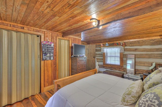 569 Hogans Branch Rd, Hendersonville, TN 37075 - bedroom with wood ceiling, hardwood / wood-style flooring, and wood walls