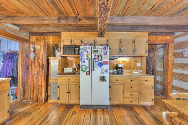 569 Hogans Branch Rd, Hendersonville, TN 37075 - kitchen featuring freestanding refrigerator, black microwave, hardwood / wood-style flooring, a wood ceiling with exposed beams, and wooden walls