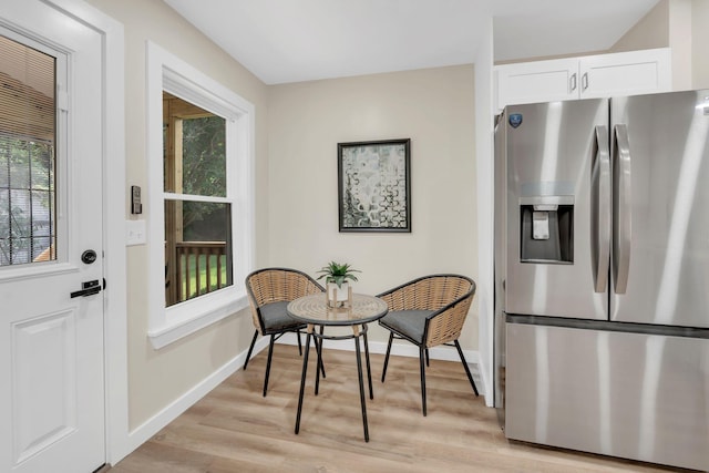 1221 Katie Ave Unit A, Nashville, TN 37207 - interior space with stainless steel fridge, light wood-style flooring, and white cabinetry