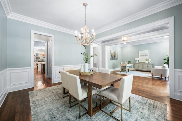 1313 Jewell Ave, Franklin, TN 37064 - dining room with a chandelier, ornamental molding, wood finished floors, wainscoting, and a decorative wall
