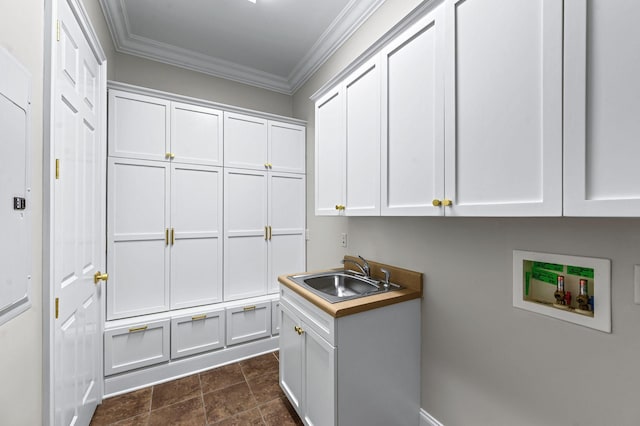 1313 Jewell Ave, Franklin, TN 37064 - laundry area featuring cabinet space, hookup for a washing machine, and crown molding