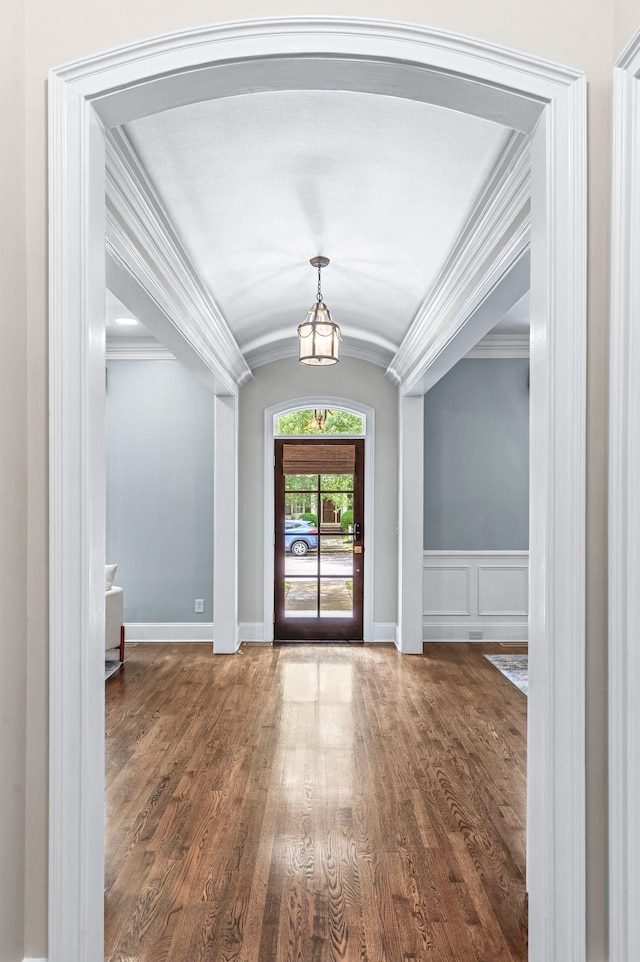 1313 Jewell Ave, Franklin, TN 37064 - entrance foyer with wood finished floors, a chandelier, vaulted ceiling, and ornamental molding