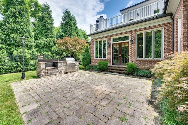1313 Jewell Ave, Franklin, TN 37064 - patio / terrace featuring french doors, an outdoor kitchen, and a patio