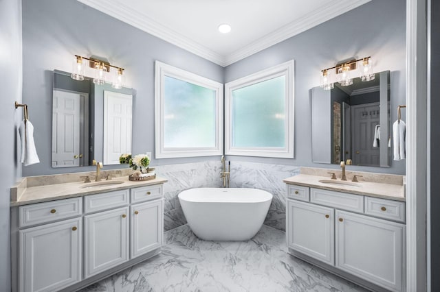 1313 Jewell Ave, Franklin, TN 37064 - bathroom with two vanities, a freestanding tub, crown molding, and marble finish floors
