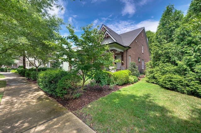 1313 Jewell Ave, Franklin, TN 37064 - view of side of property with brick siding and a yard