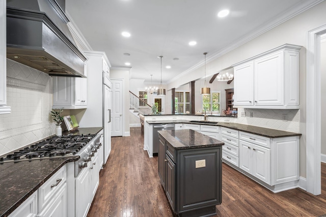 1313 Jewell Ave, Franklin, TN 37064 - kitchen with custom exhaust hood, appliances with stainless steel finishes, a peninsula, white cabinetry, and decorative backsplash