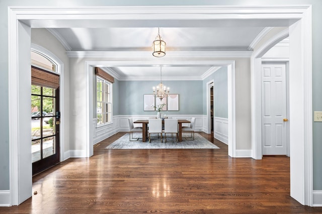 1313 Jewell Ave, Franklin, TN 37064 - dining space featuring crown molding, dark wood-style floors, a chandelier, and a wainscoted wall