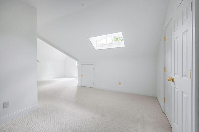 1313 Jewell Ave, Franklin, TN 37064 - bonus room with a skylight, vaulted ceiling, and light carpet
