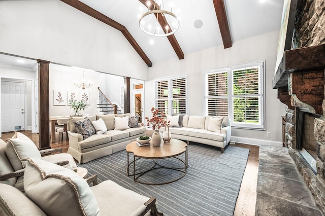 1313 Jewell Ave, Franklin, TN 37064 - living area featuring a chandelier, a fireplace, ornate columns, high vaulted ceiling, and beam ceiling