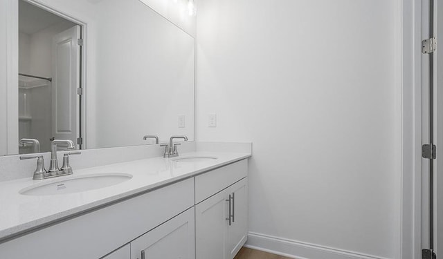 2901 Windstone Trl, Columbia, TN 38401 - bathroom with double vanity and baseboards