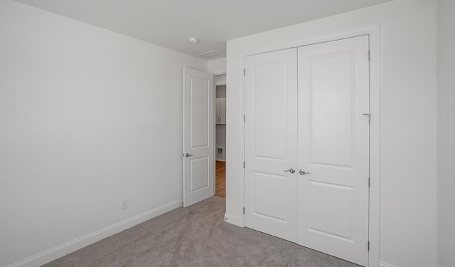 2901 Windstone Trl, Columbia, TN 38401 - unfurnished bedroom featuring a closet and carpet floors