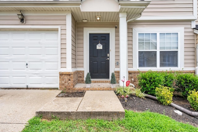 1515 Bridgecrest Dr Unit 408, Antioch, TN 37013 - view of exterior entry featuring a garage