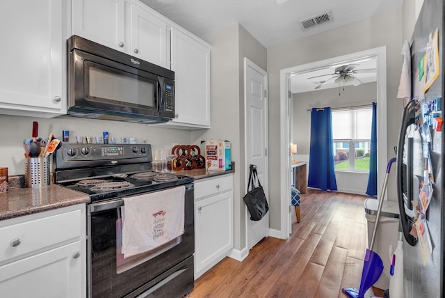 1515 Bridgecrest Dr Unit 408, Antioch, TN 37013 - kitchen with black appliances, light wood-style flooring, white cabinets, and ceiling fan