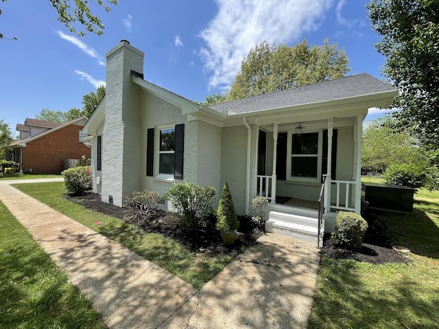 621 Buck Ln, Murfreesboro, TN 37129 - view of front of house featuring a chimney, a porch, and stucco siding