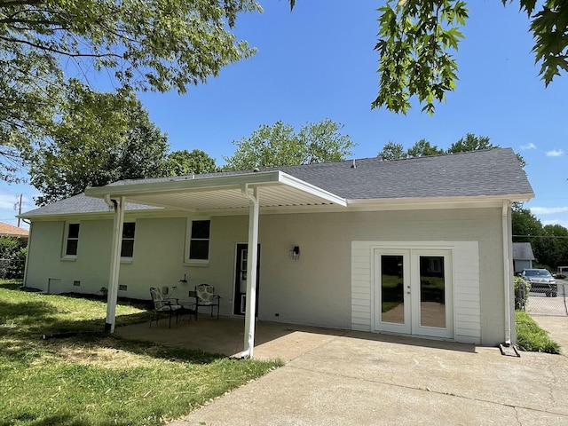 621 Buck Ln, Murfreesboro, TN 37129 - back of property with a lawn, a shingled roof, french doors, and a patio area