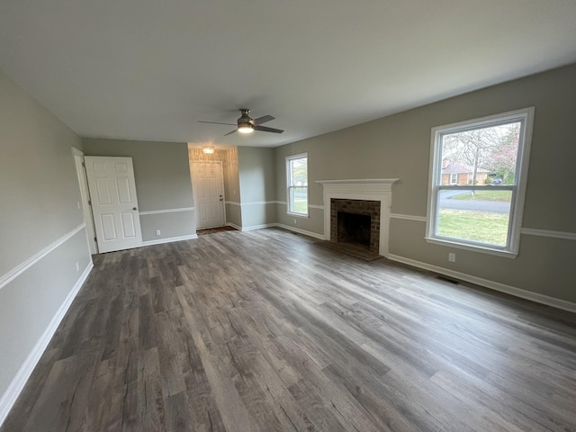 621 Buck Ln, Murfreesboro, TN 37129 - unfurnished living room featuring a ceiling fan, dark wood-style floors, and a brick fireplace
