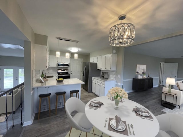 621 Buck Ln, Murfreesboro, TN 37129 - dining room featuring wood finished floors and a chandelier