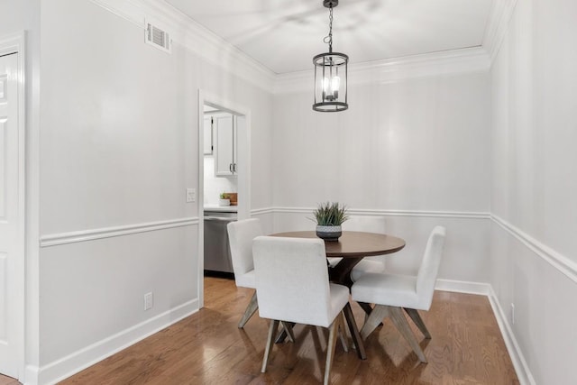 416 Sloan Rd, Nashville, TN 37209 - dining area with crown molding and wood finished floors