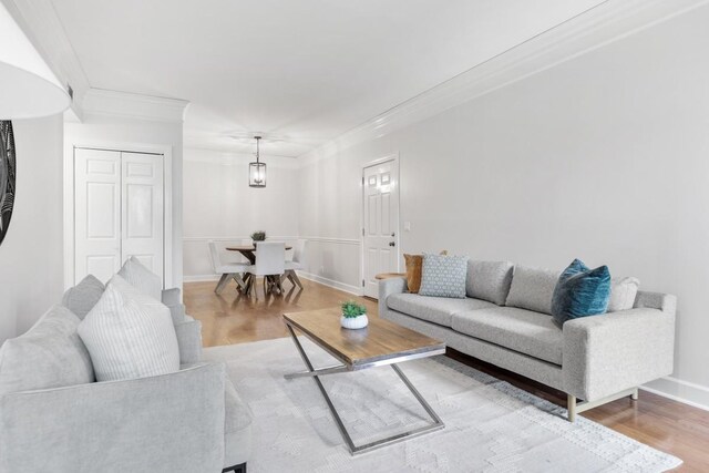 416 Sloan Rd, Nashville, TN 37209 - living area featuring wood finished floors and crown molding