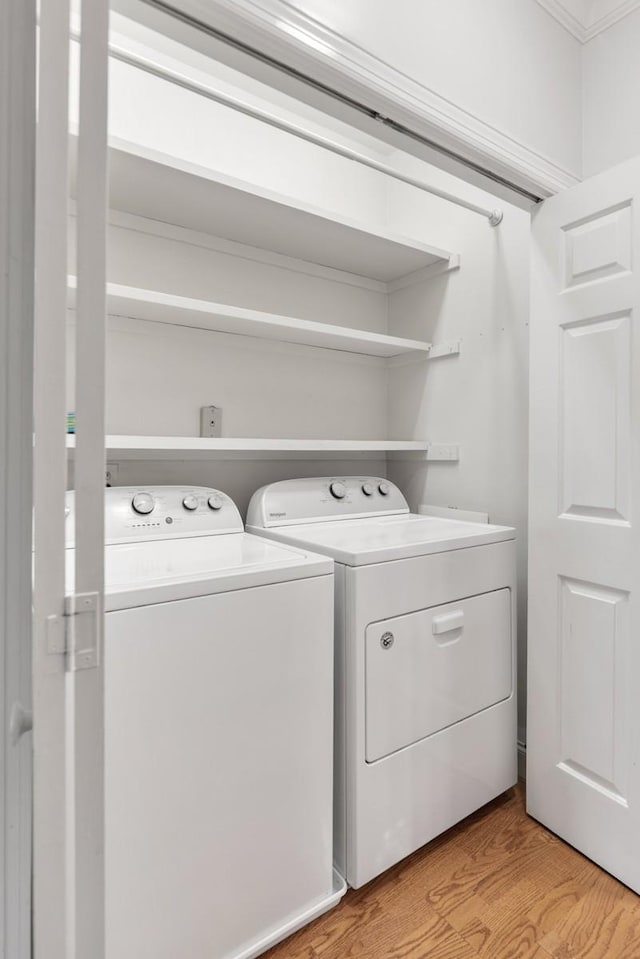 416 Sloan Rd, Nashville, TN 37209 - laundry room featuring washer and dryer and light wood-type flooring