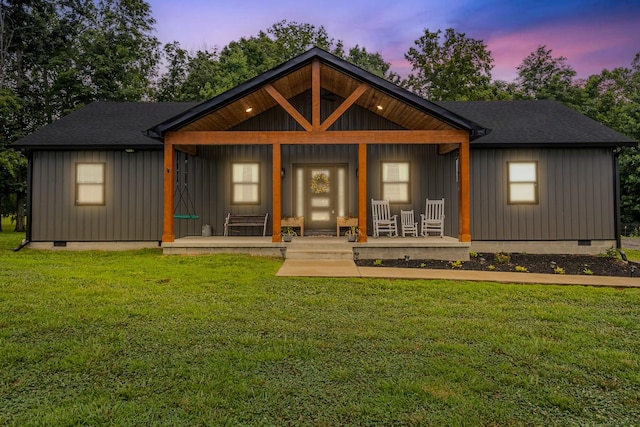 1567 Oak Knob Rd, Lafayette, TN 37083 - view of front of property featuring a porch, crawl space, board and batten siding, and a lawn