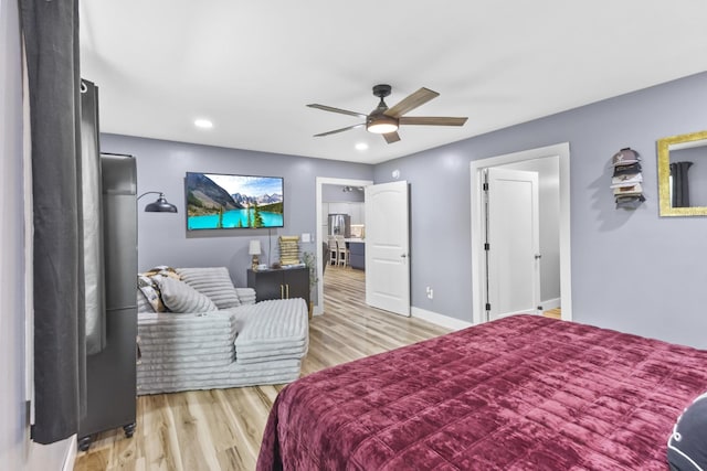 1567 Oak Knob Rd, Lafayette, TN 37083 - bedroom featuring light wood-type flooring, recessed lighting, and a ceiling fan