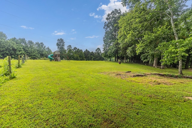 1567 Oak Knob Rd, Lafayette, TN 37083 - view of green lawn featuring a playground