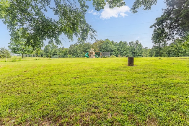 1567 Oak Knob Rd, Lafayette, TN 37083 - view of green lawn with a playground