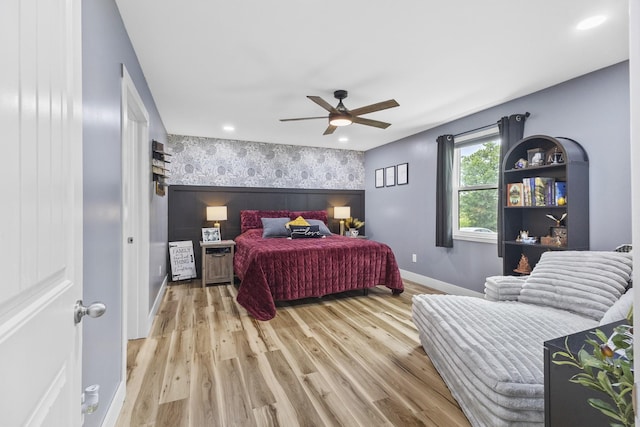 1567 Oak Knob Rd, Lafayette, TN 37083 - bedroom featuring an accent wall, light wood-type flooring, recessed lighting, and ceiling fan