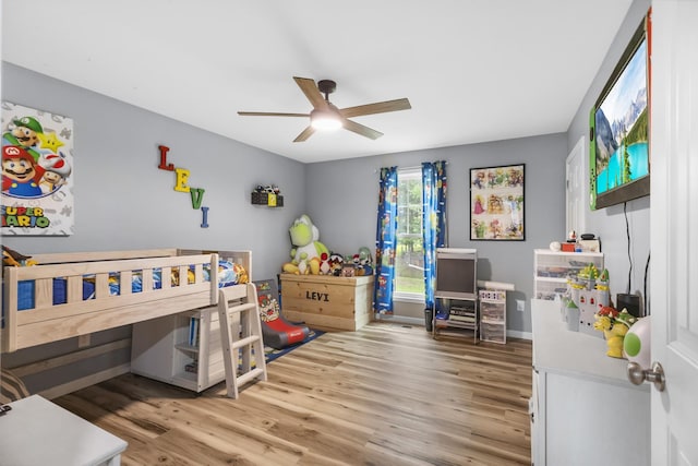 1567 Oak Knob Rd, Lafayette, TN 37083 - bedroom featuring wood finished floors and ceiling fan