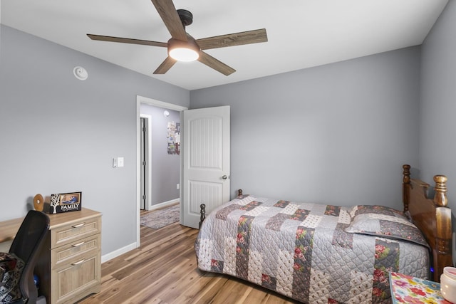 1567 Oak Knob Rd, Lafayette, TN 37083 - bedroom with light wood finished floors and a ceiling fan