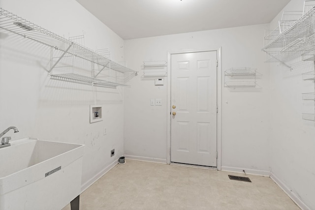 1729 Dryden Dr, Spring Hill, TN 37174 - washroom featuring washer hookup and light flooring