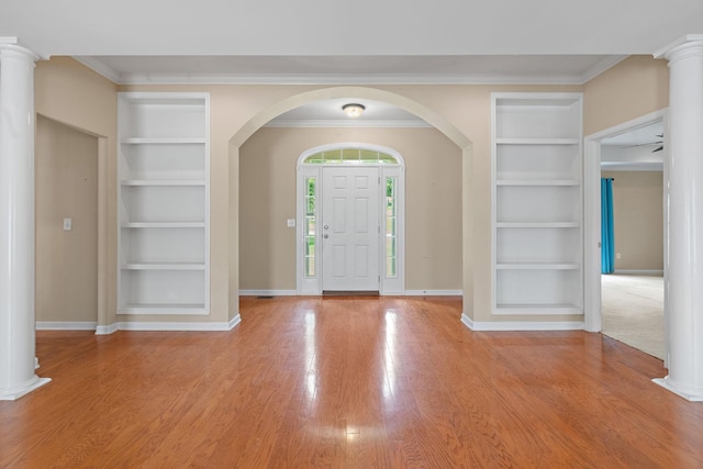 1729 Dryden Dr, Spring Hill, TN 37174 - entryway with wood finished floors, arched walkways, crown molding, and decorative columns