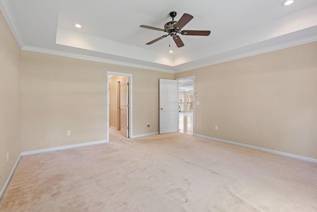 1729 Dryden Dr, Spring Hill, TN 37174 - spare room featuring a raised ceiling, recessed lighting, light colored carpet, ceiling fan, and ornamental molding