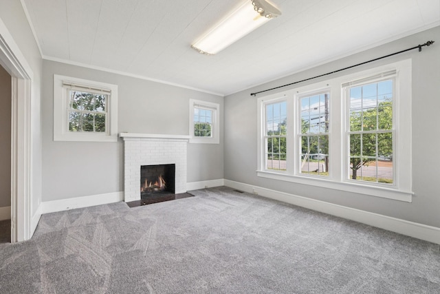1221 W Commerce St W, Lewisburg, TN 37091 - unfurnished living room with carpet, a brick fireplace, and crown molding