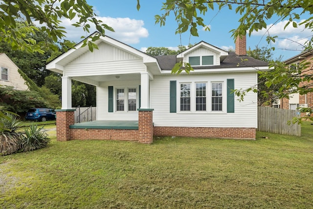 1221 W Commerce St W, Lewisburg, TN 37091 - back of house with a porch, a chimney, and a shingled roof