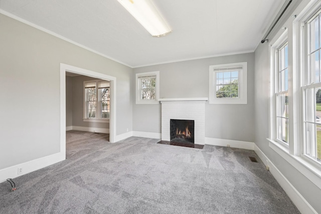 1221 W Commerce St W, Lewisburg, TN 37091 - unfurnished living room featuring carpet, a fireplace, and ornamental molding