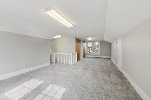 1221 W Commerce St W, Lewisburg, TN 37091 - bonus room featuring vaulted ceiling and carpet