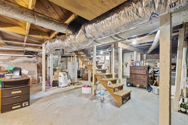 1221 W Commerce St W, Lewisburg, TN 37091 - unfinished below grade area featuring stairs and water heater