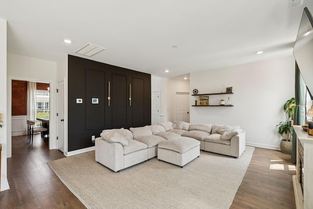 6007 Cavalry Ct, Spring Hill, TN 37174 - living area with dark wood-style floors and recessed lighting
