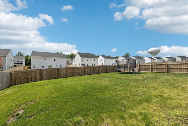 6007 Cavalry Ct, Spring Hill, TN 37174 - fenced backyard featuring a residential view and a trampoline