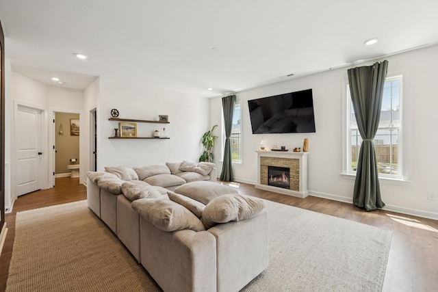 6007 Cavalry Ct, Spring Hill, TN 37174 - living room featuring wood finished floors, a fireplace, and recessed lighting