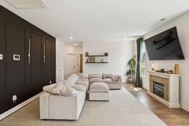 6007 Cavalry Ct, Spring Hill, TN 37174 - living room featuring recessed lighting, wood finished floors, and a fireplace