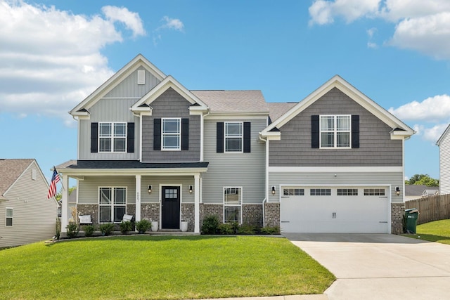 6007 Cavalry Ct, Spring Hill, TN 37174 - craftsman inspired home with driveway, an attached garage, a porch, and board and batten siding