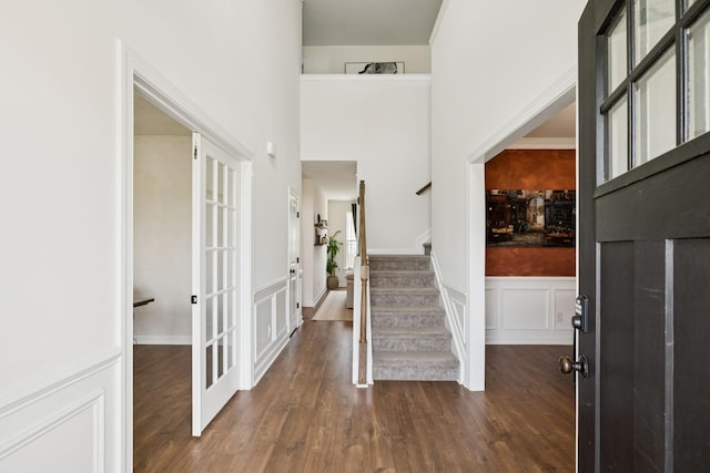 6007 Cavalry Ct, Spring Hill, TN 37174 - entrance foyer featuring stairs, dark wood-style floors, french doors, and wainscoting