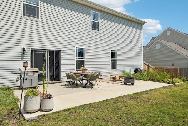 6007 Cavalry Ct, Spring Hill, TN 37174 - back of house featuring a fire pit and a patio