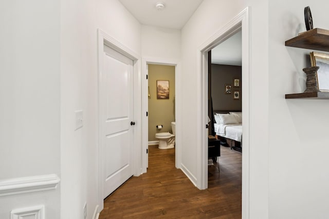 6007 Cavalry Ct, Spring Hill, TN 37174 - hallway featuring dark wood-style flooring and baseboards