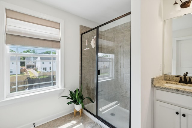 6007 Cavalry Ct, Spring Hill, TN 37174 - full bathroom with a shower stall, vanity, and tile patterned flooring