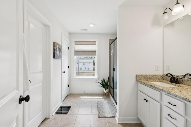 6007 Cavalry Ct, Spring Hill, TN 37174 - full bath featuring vanity, a stall shower, and tile patterned floors